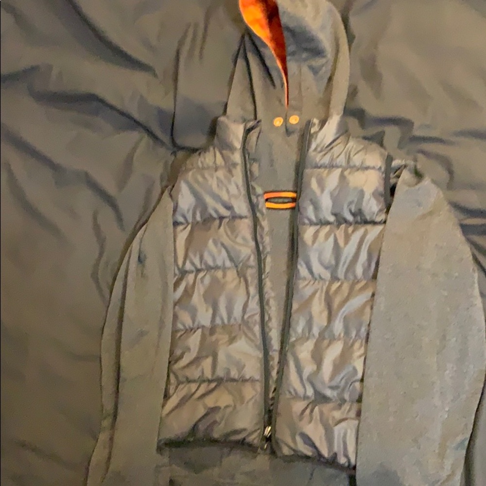 Under armour hoodie and old hazy vest.